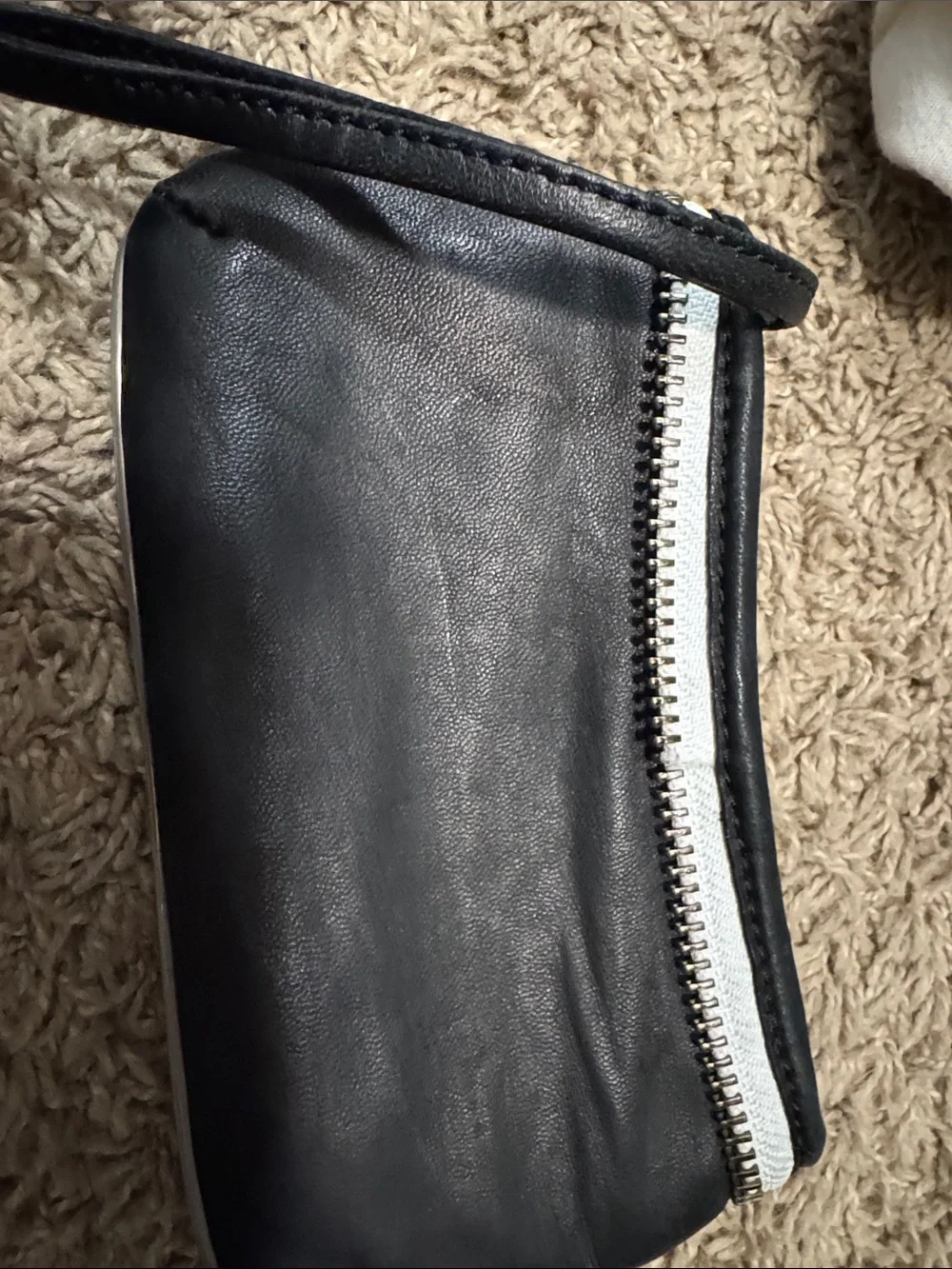 L.A.M.B. Black Wristlet with White Trim and Metal Plate
